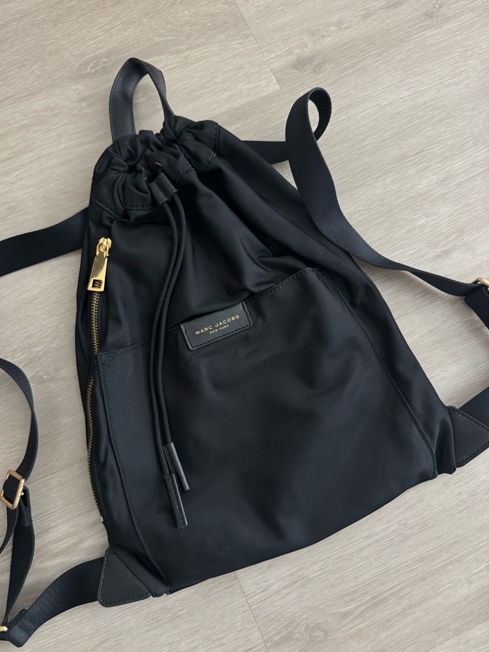 Like New Marc Jacobs Black Nylon Drawstring Backpack with Gold Hardware